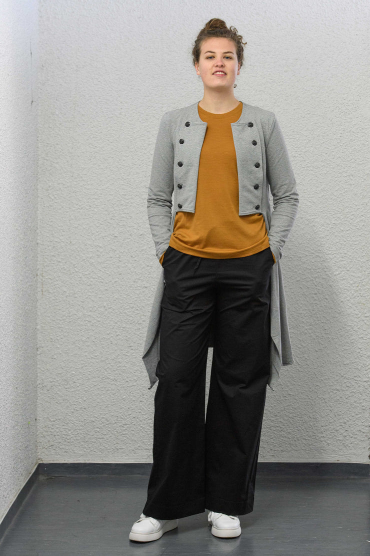 Tall woman wearing X Lab Coat Grey model front
