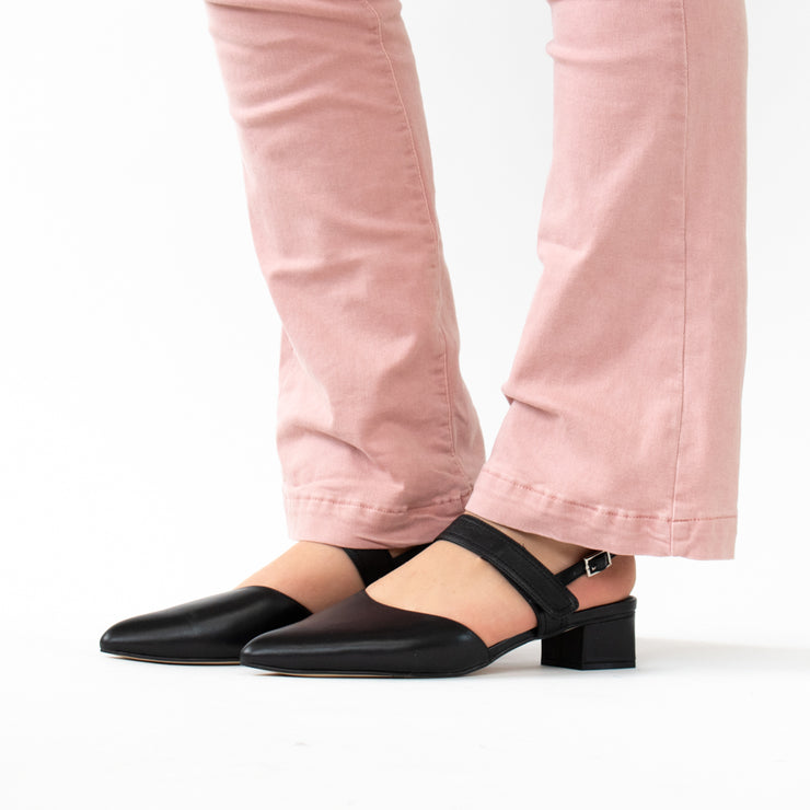 Minx Astrid Black Shoe Black side. Size 42 womens shoes. On tall model.
