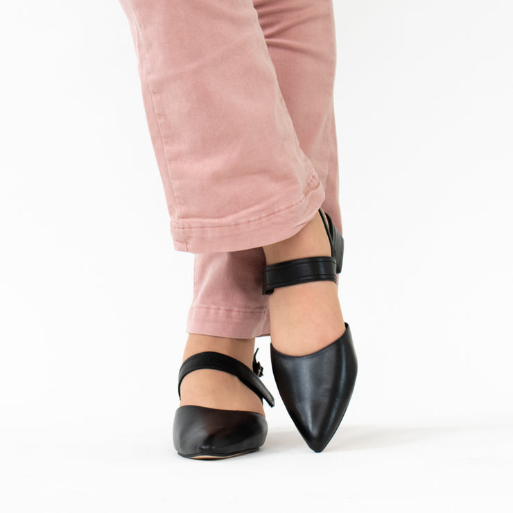 Minx Astrid Black Shoe Black side. Size 42 womens shoes. Front view on model.