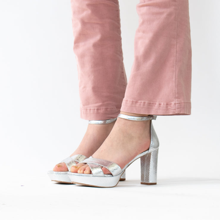 Dansi Pamplona Silver Print Sandals side. Size 42 womens shoes. On model front view.