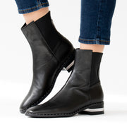 Django and Juliette Ferlee Black Ankle Boots Model Shot side. Size 43 womens shoes