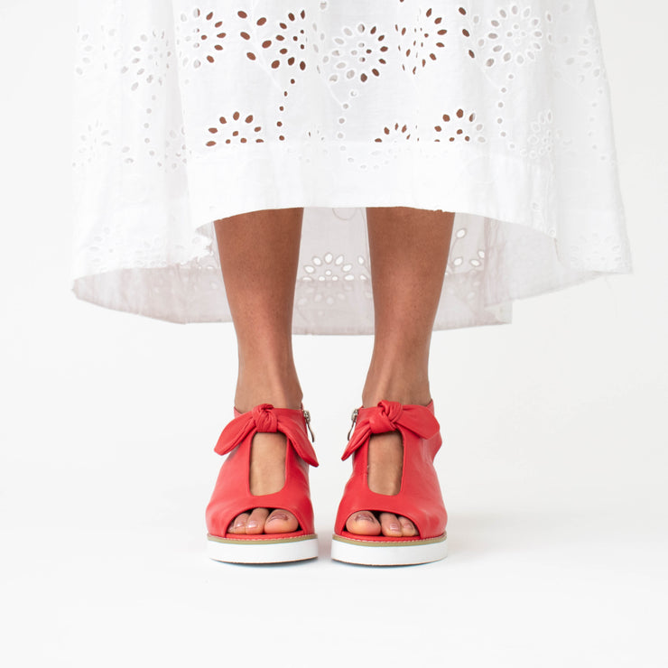 Hinako Mossman Red Sandals front model shot.