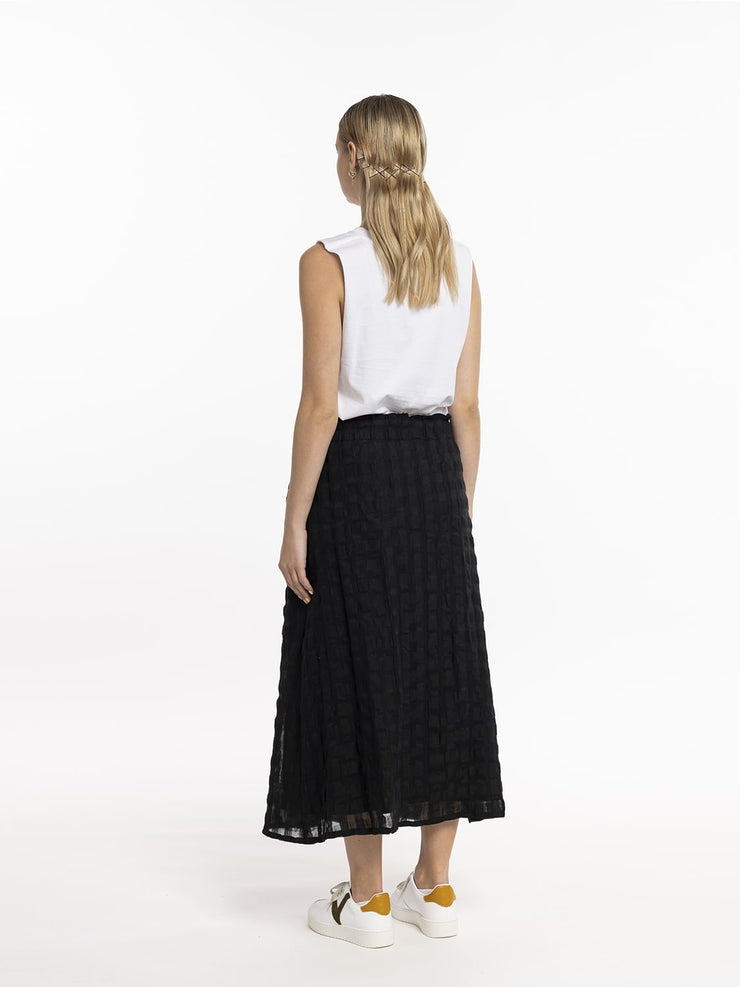 Model in Style X Lab Refraction Skirt Back View White Top made longer for tall women