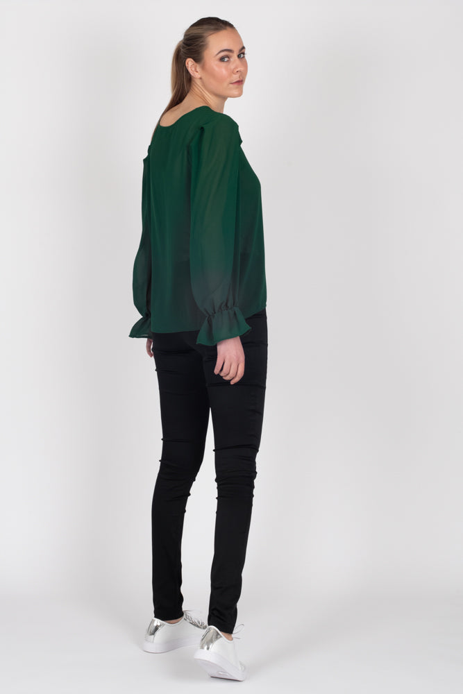Tall model wearing Amelia Top Forest, side