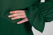 Tall model wearing Amelia Top Forest, sleeve detail