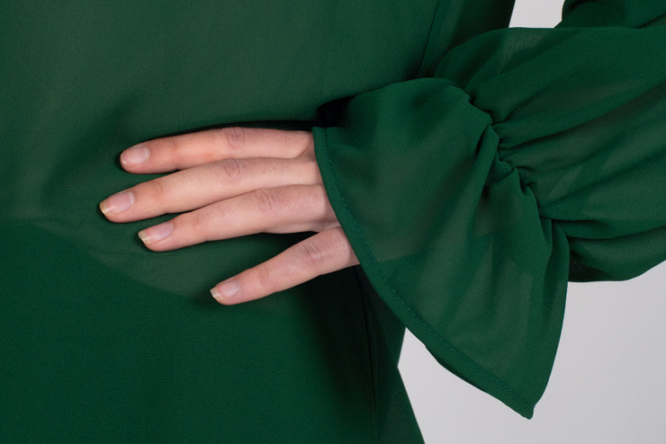 Tall model wearing Amelia Top Forest, sleeve detail