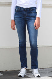 Tall model wearing Aspen Y 34Leg Sian Wash Jeans for tall women