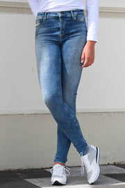 Tall woman in Tanya B 34Leg Nisha Wash jeans for tall women