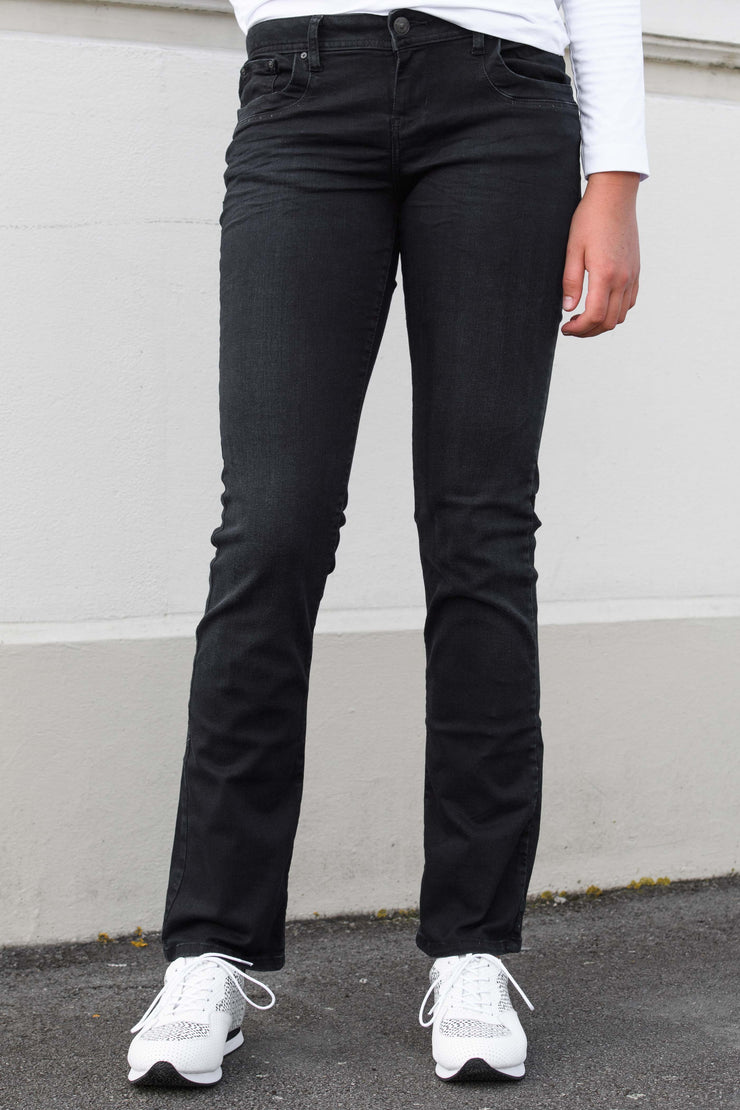Tall model wearing Valerie Camenta 34Leg Jeans made longer for tall women