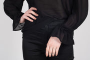 Tall model wearing Amelia Top Black, front with sleeve detail