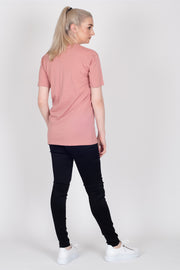 Tall model wearing Crossing The Lines Tee Rose, back