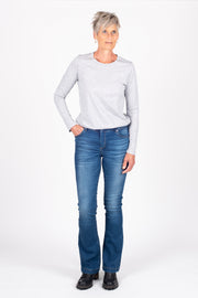 Tall model wearing Fallon Jeans Blue Wash, front