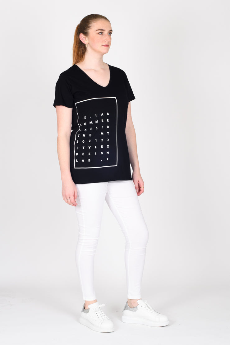 Side view of Tall model wearing Design Your Life V Tee Black for tall women