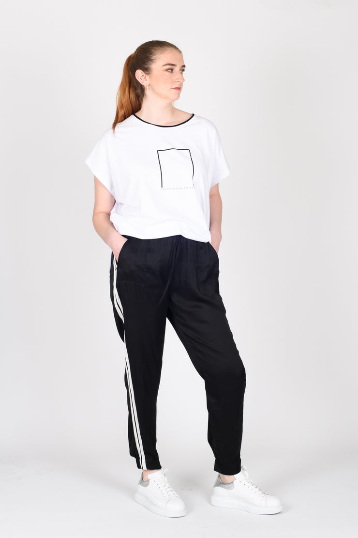 Tall model standing in Side Swipe Relax Pants for tall women