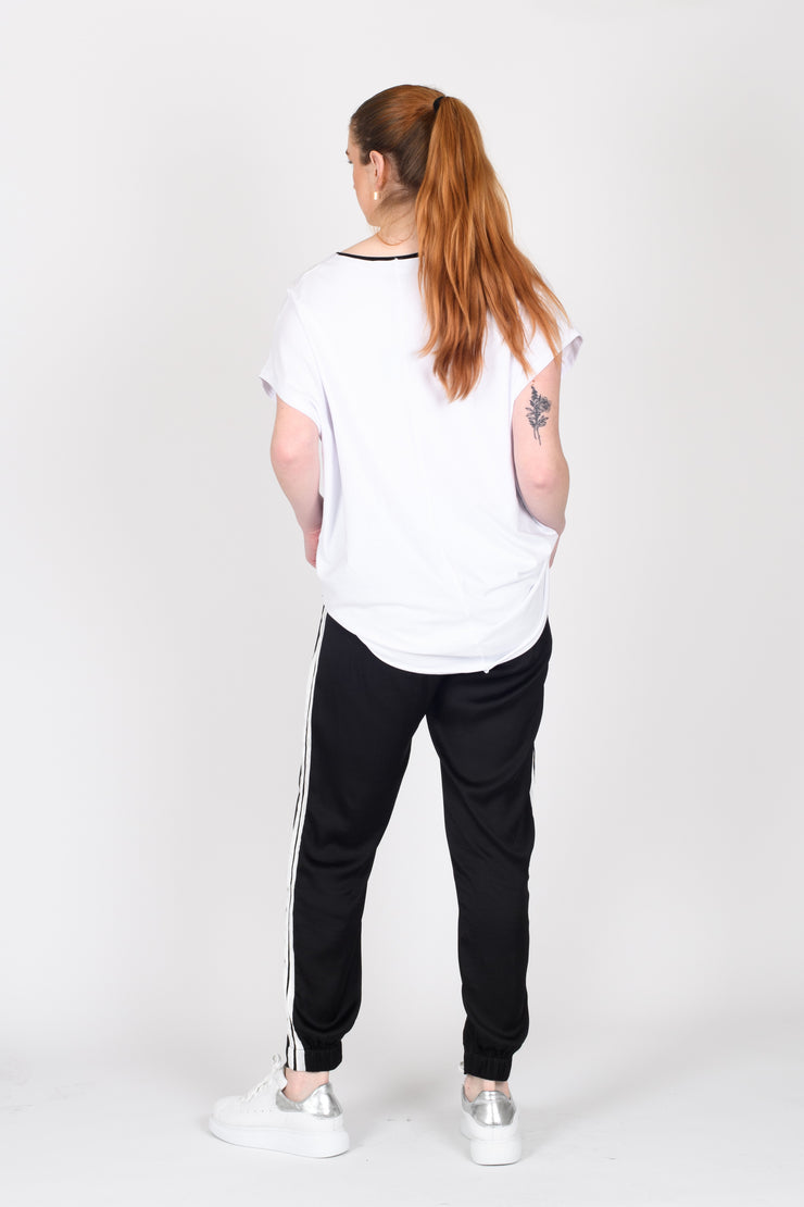 Back view of Tall model standing in Side Swipe Relax Pants for tall women