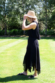Side view tall model wearing Drape Dress Black made longer for tall women