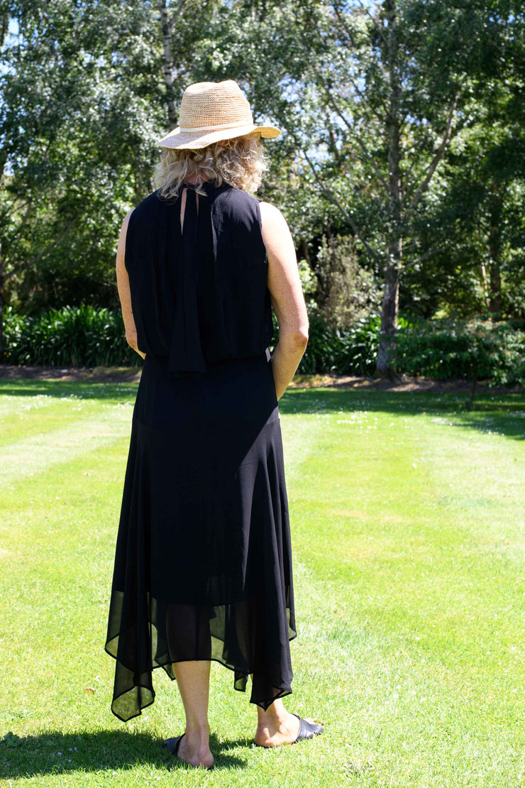 Back view tall model wearing Drape Dress Black made longer for tall women