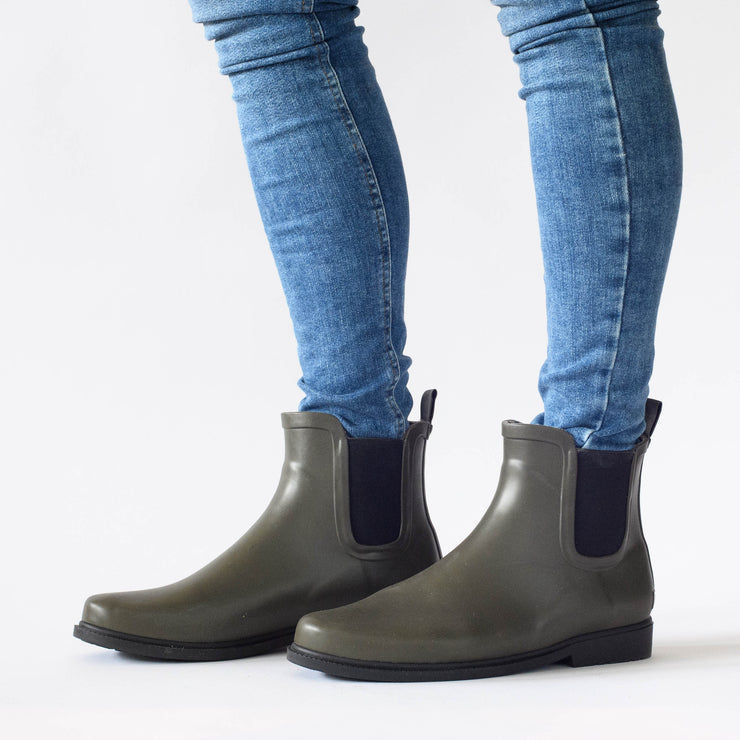Model wearing Muddy Olive boots