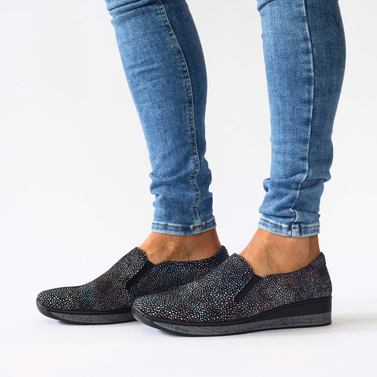Model wearing Cassini Mantilly Rockpool Shoes. Womens size 45 shoes