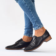 Model wearing Bresley Darby Black leather shoes. Womens size 45 shoes