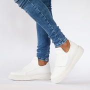 Model wearing Gelato Bodee White Sneakers. Womens size 43 shoes