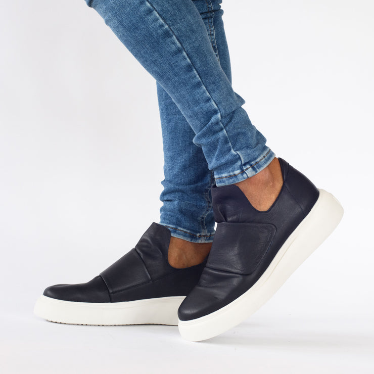 Model wearing Gelato Bodee Navy Sneakers. Womens size 43 shoes