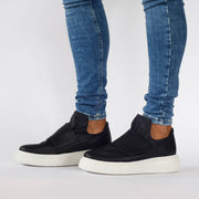 Model wearing Gelato Bodee Black Sneakers. Womens size 44 shoes