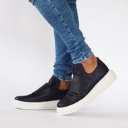 Model wearing Gelato Bodee Black Sneakers. Womens size 43 shoes