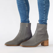 Model in Hush Puppies Superb Light Grey size 11 ankle boots