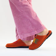 Model wearing Westland brand Lille 102 slippers in Orange. Size 44 womens slippers