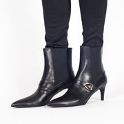 Model wearing Moda di Fausto Donna Black Ankle Boots. Women size 42 boots