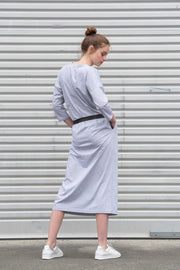 Tall model wearing Lulu Dress Grey Marle, back with belt detail