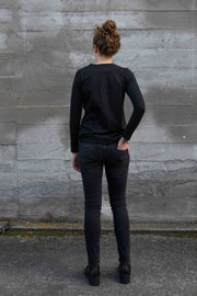 Back view of tall model wearing Molly M jeans in Hara Wash. Made longer for tall women