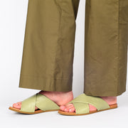 Model wearing Rilassare Tackle V2 Khaki Sandal for long feet. Size 42 womens shoes
