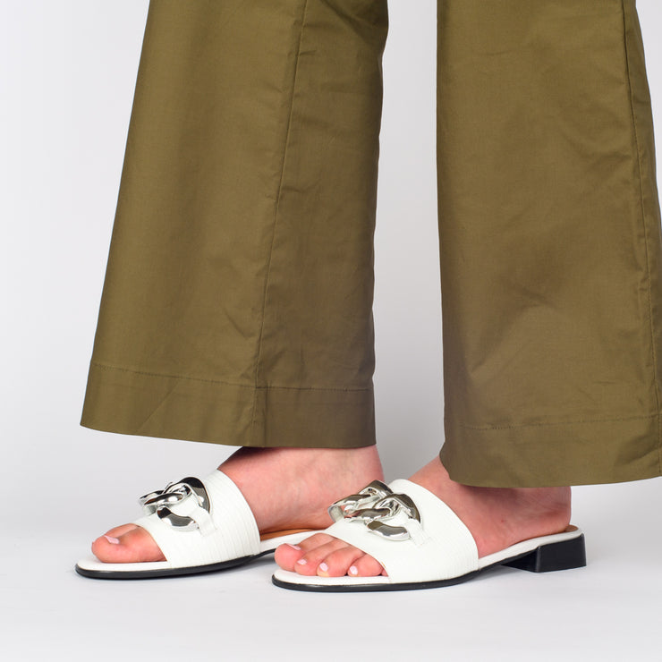Model wearing Tamara London Benny White Reptile Silver Sandal for long feet. Size 42 womens shoes