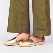 Model wearing Hush Puppies Baleal Tan Champagne shoes. Size 10 women's espadrille