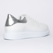 Punk White Silver back. Size 12 women's shoes