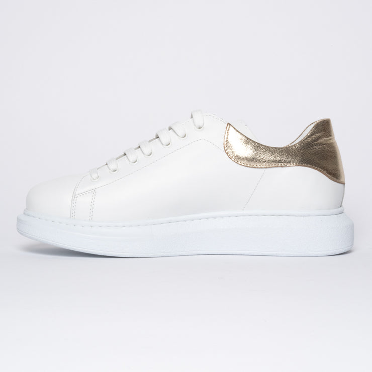 Punk White Gold inside. Size 13 women's shoes.