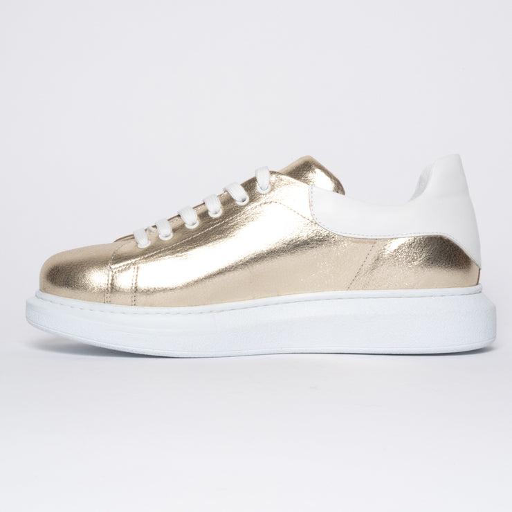 Arrow 2 Gold inside. Size 13 women's shoes.