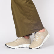 Model wearing Josef Seibel Noih 05 Beige Sneakers. Womens size 44 shoes
