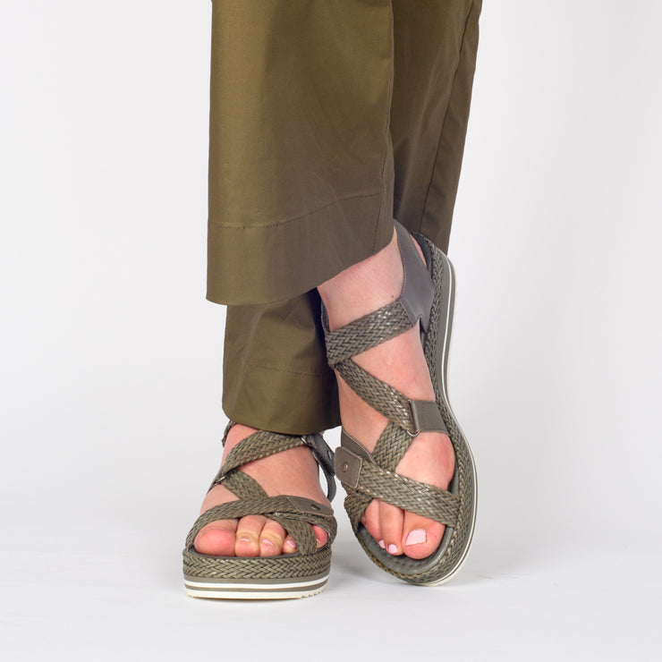 Model wearing Django and Juliette Adelyna Dark Khaki Sandals. Size 44 womens shoes