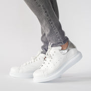 Model wearing Babouche Lifestyle Punk White Silver. Size 12 women's shoes
