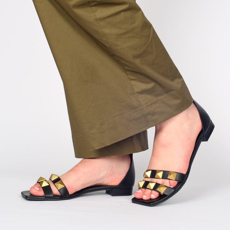 Model wearing Dansi Althea Black Sandals. Size 43 womens shoes