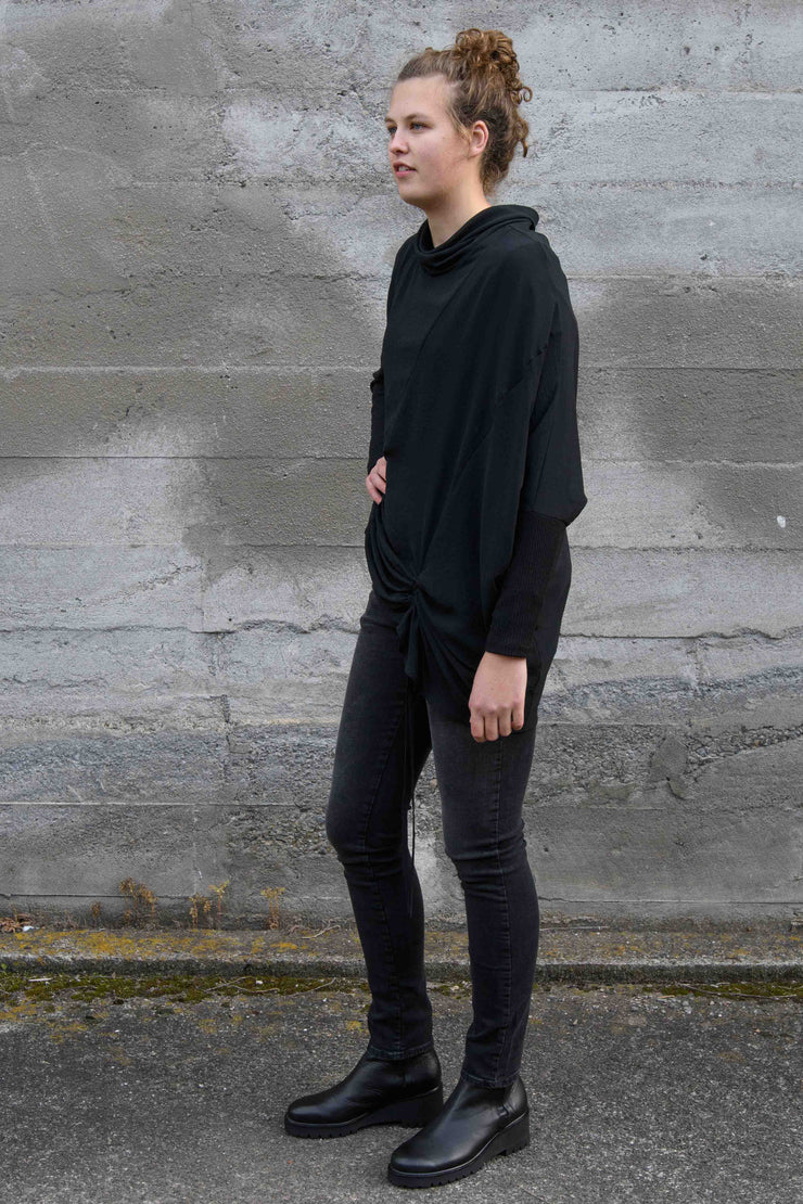Tall woman wearing X Lab Beginnings Top in Black