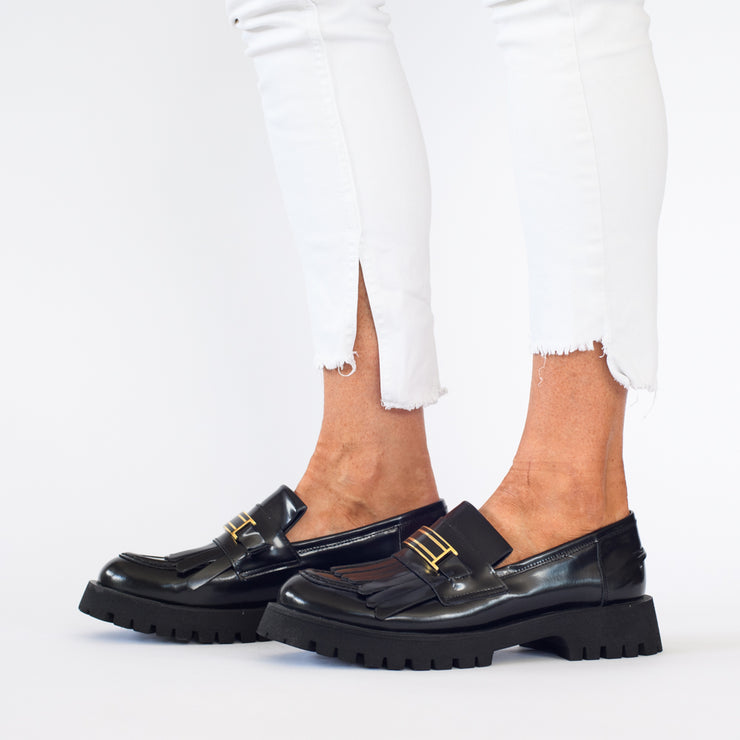 Model wearing Babouche Lifestyle Reanne Black Hi Shine shoes. Womens size 43 shoes