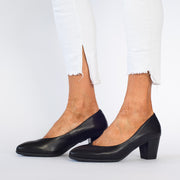 Model wearing Hush Puppies The Point Black court shoes. Womens size 11 shoes