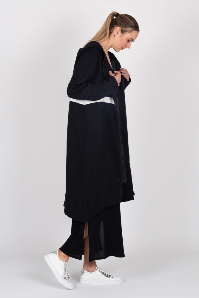 Tall model wearing Linen Coat Black, side