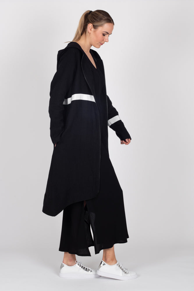 Tall model wearing Linen Coat Black, side