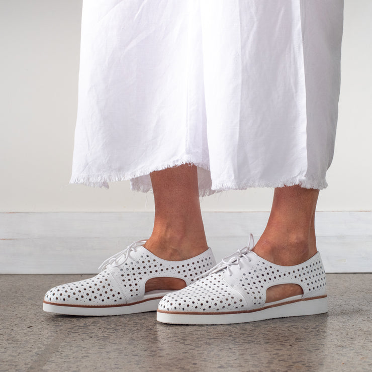Model wearing Bresley Michel White shoes. Size 45 women's shoes