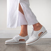 Model wearing Bresley Michel White shoes. Size 46 women's shoes